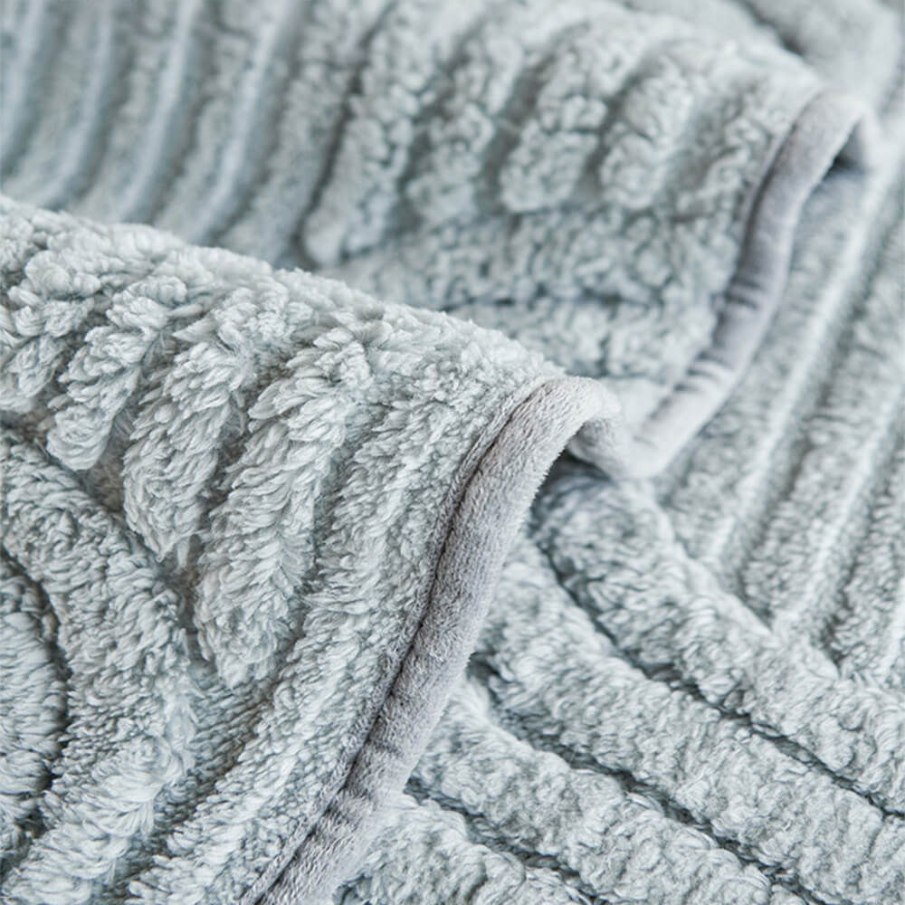 Housse de canapé moderne en peluche douce antidérapante motif géométrique