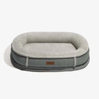 Lit pour chien orthopédique en forme de donut rembourré en similicuir deluxe amovible - WarmNest
