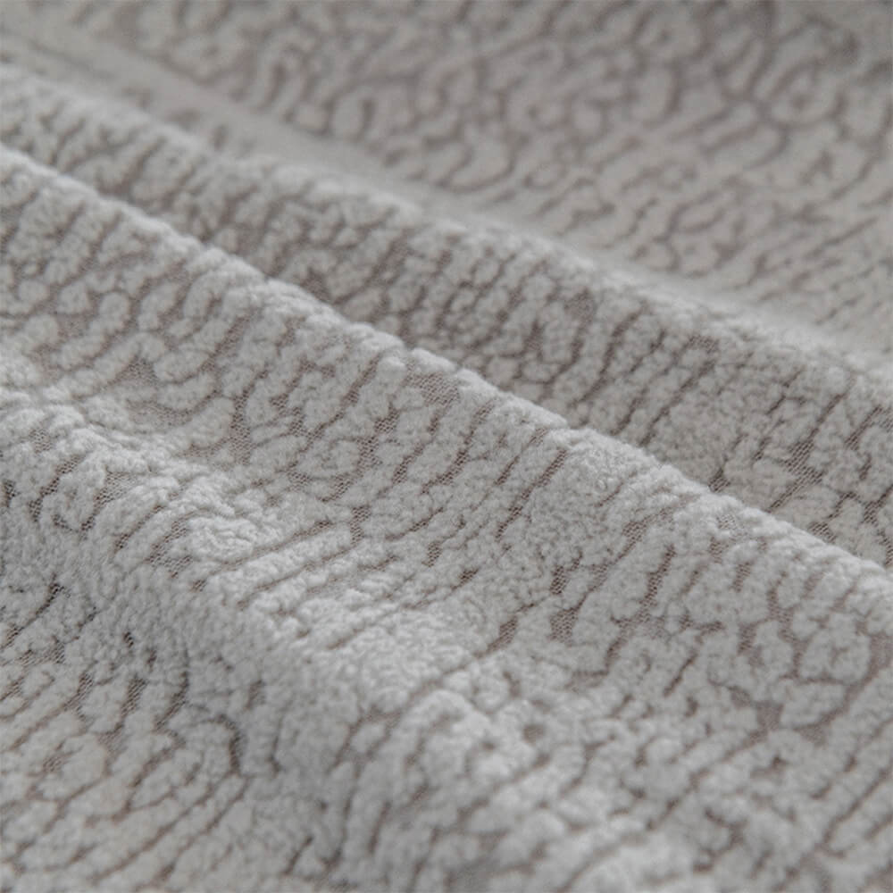 Housse de canapé extensible en velours jacquard à motifs diamants