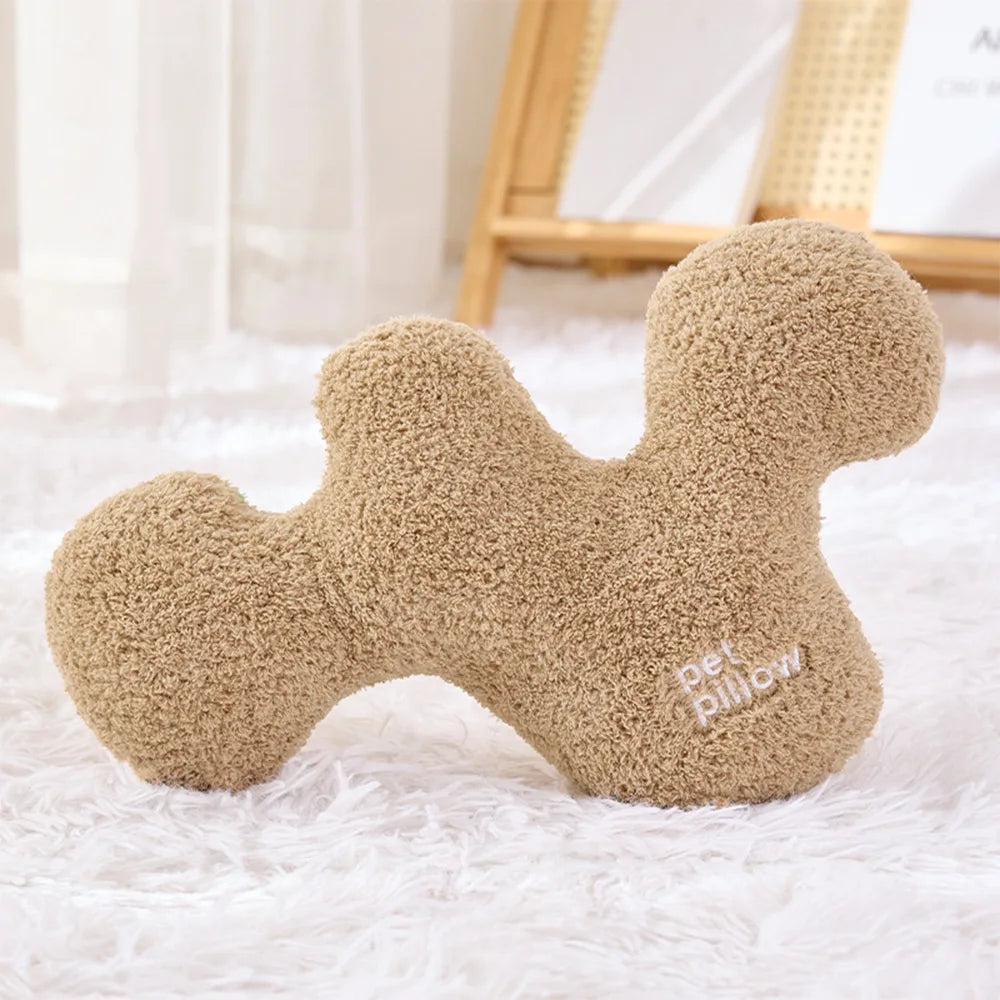 Coussin jouet pour chien en forme d’os avec couineur