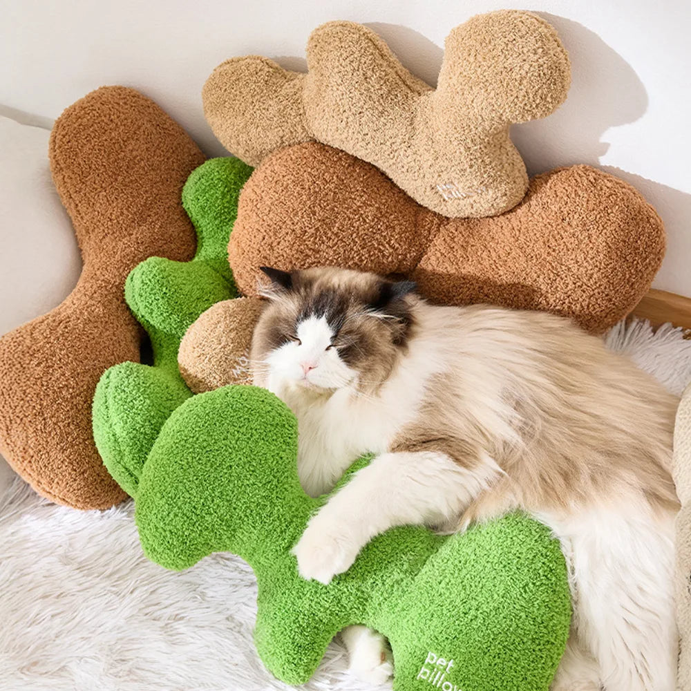 Coussin jouet pour chien en forme d’os avec couineur